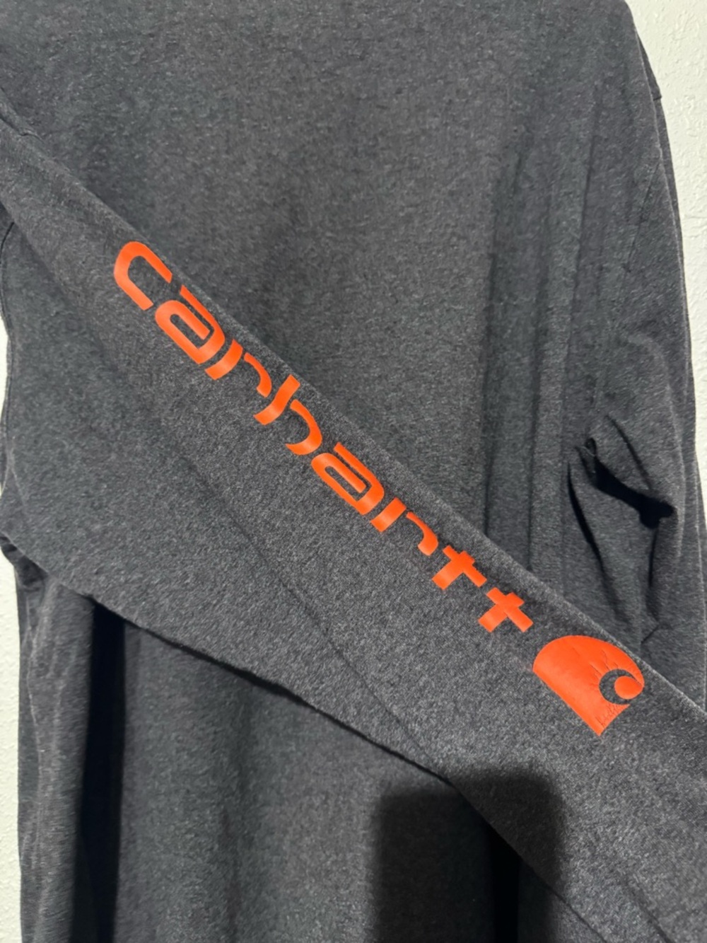Carhartt XL loose fit charcoal gray long sleeve shirt orange lettering on sleeve